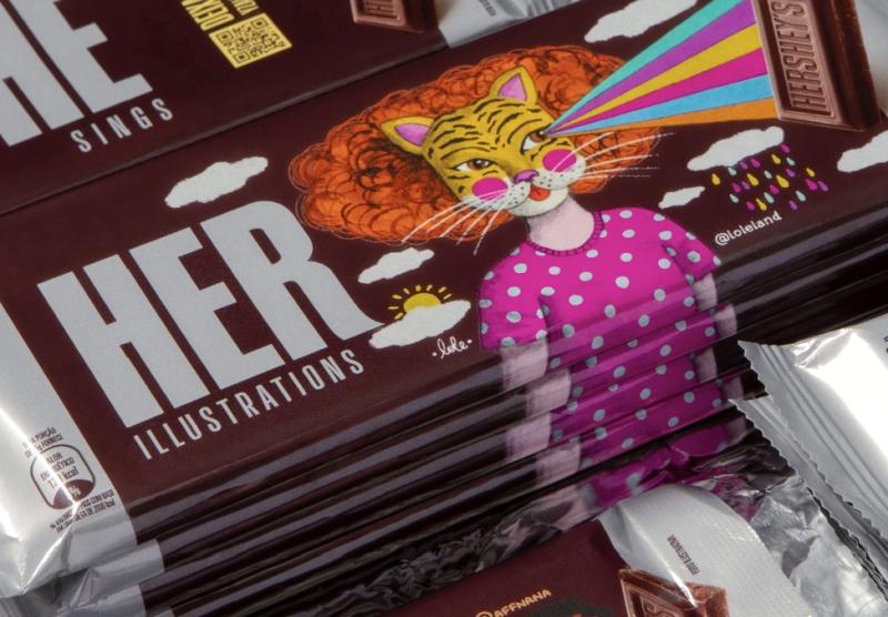 <span style = 'font-size:120%; font-weight: bold;'>HerShe</span><br>Ação especial da Hershey’s para o Dia Internacional da Mulher usou as barras de chocolate da marca para promover e valor...